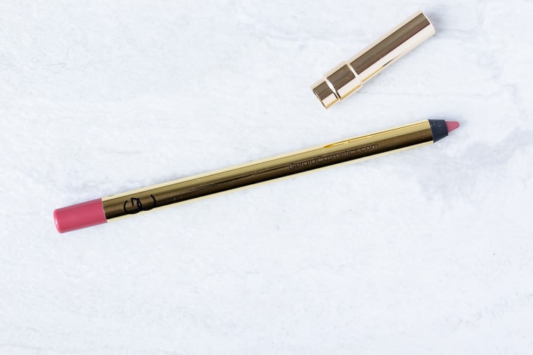 Gerard cosmetics lip liner in bel air with the lid removed on a white background