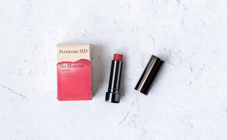 Perricone MD No Makeup lipstick packaging and opened tube on a white background