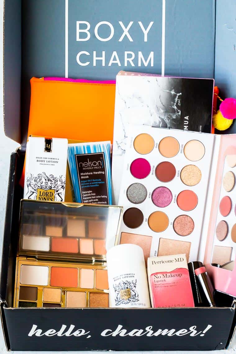 My July 2020 BoxyCharm Premium box opened with the products and packaging displayed inside of it