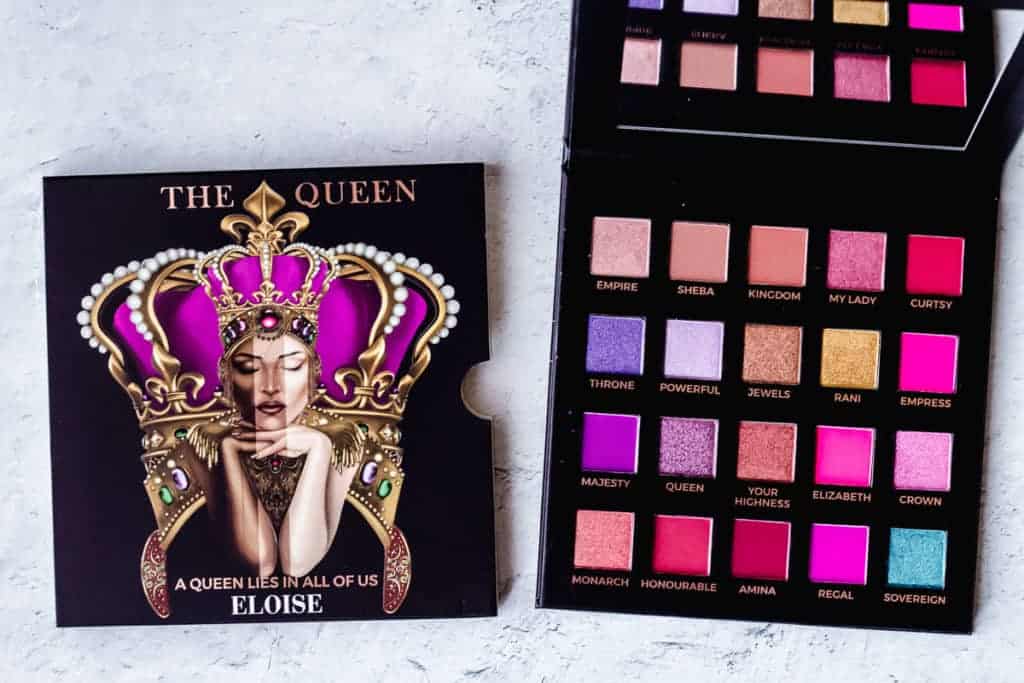 Eloise Beauty The Queen Eyeshadow palette opened next to its box to show the colors inside