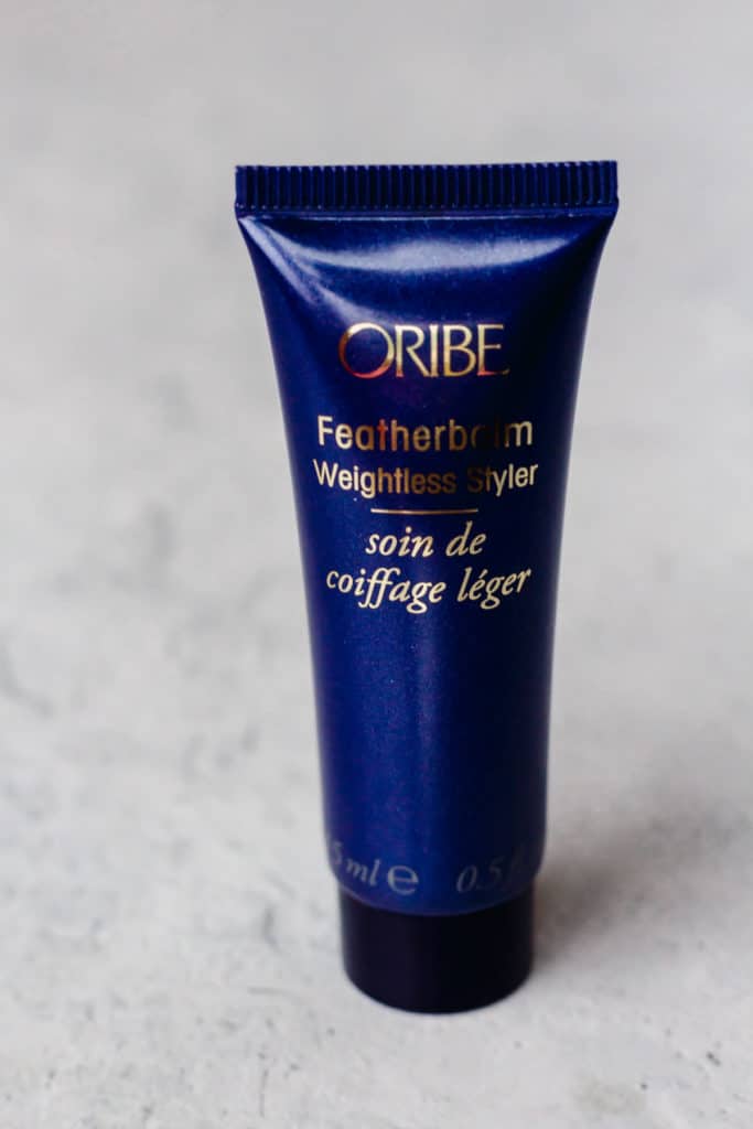 Oribe Featherbalm styling cream sample on a white background