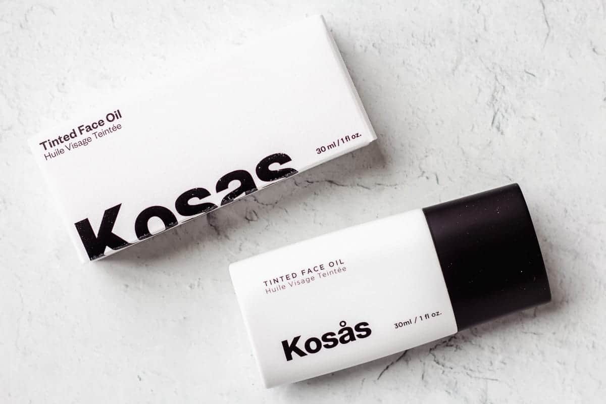 Kosas tinted oil foundation tube and box on a white background
