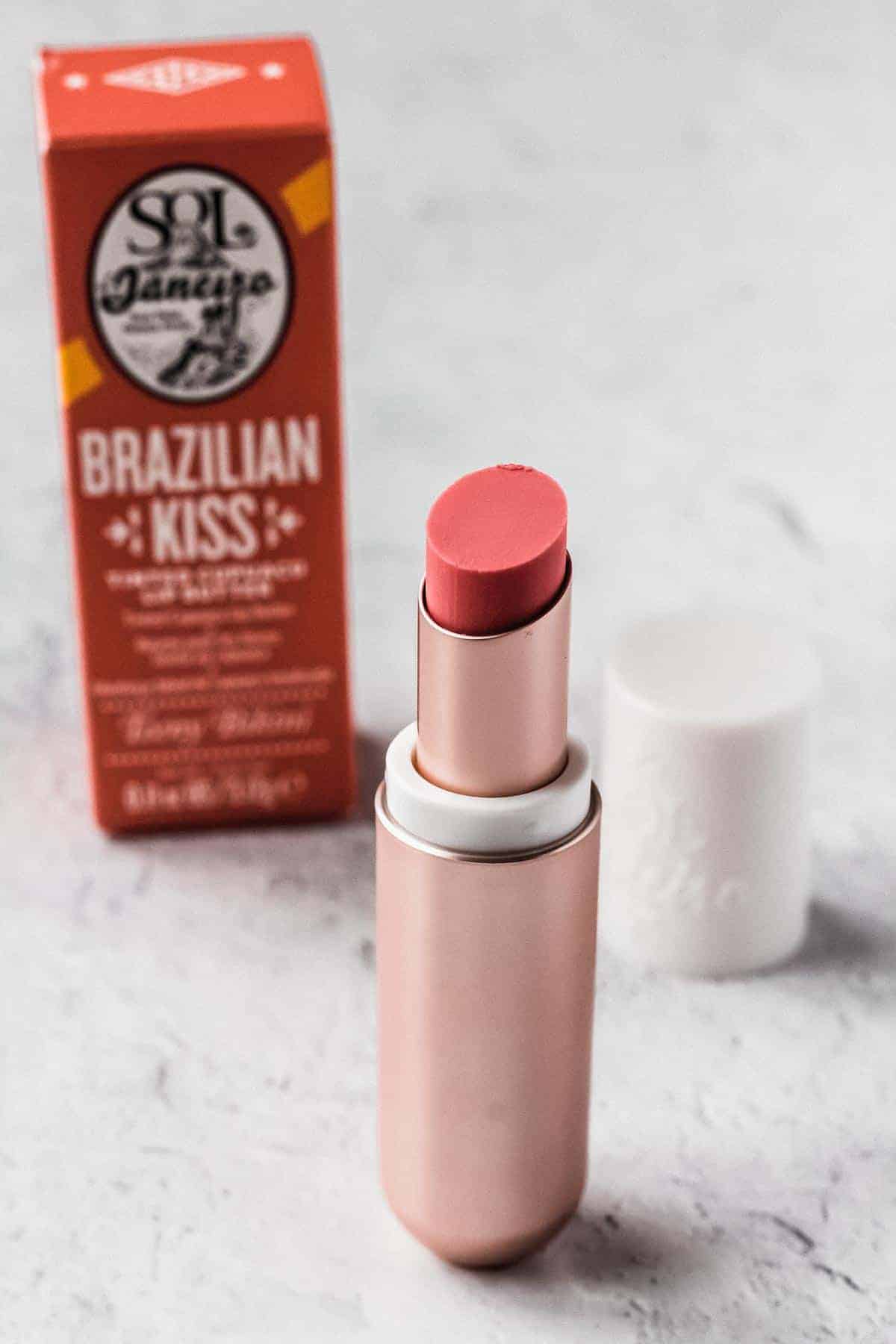 Sol de Janeiro Brazilian Kiss Tinted Cupuacu Lip Butter in Teeny Bikini opened on a white background