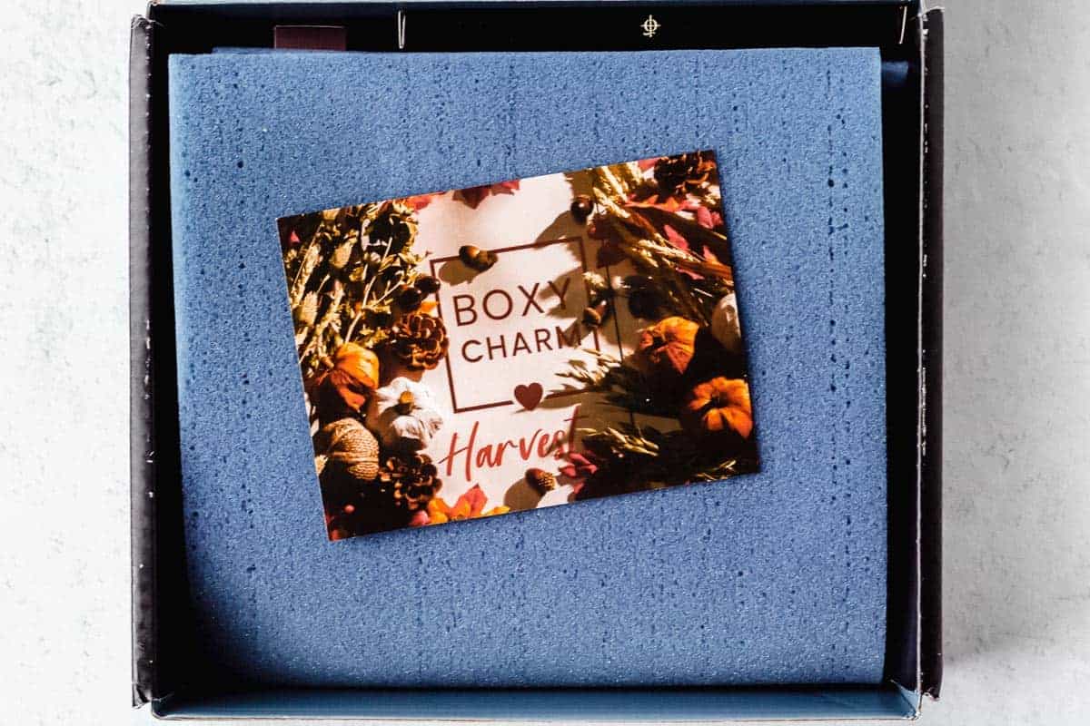 Boxycharm premium box opened with the November 2020 Harvest insert card on top