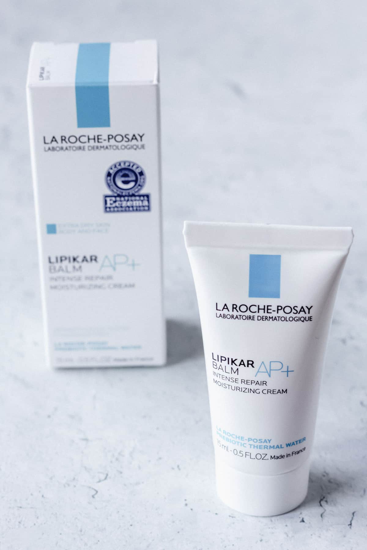 La Roche-Posay Lipikar Balm Intense Repiar Moisturizing Cream sample tube and box on a white background