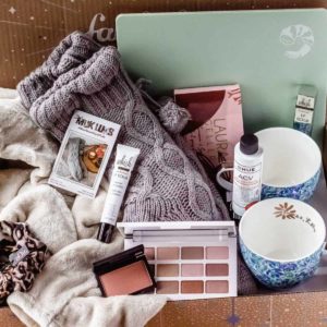 Items from the winter 2020 fabfitfun box displayed inside of the box