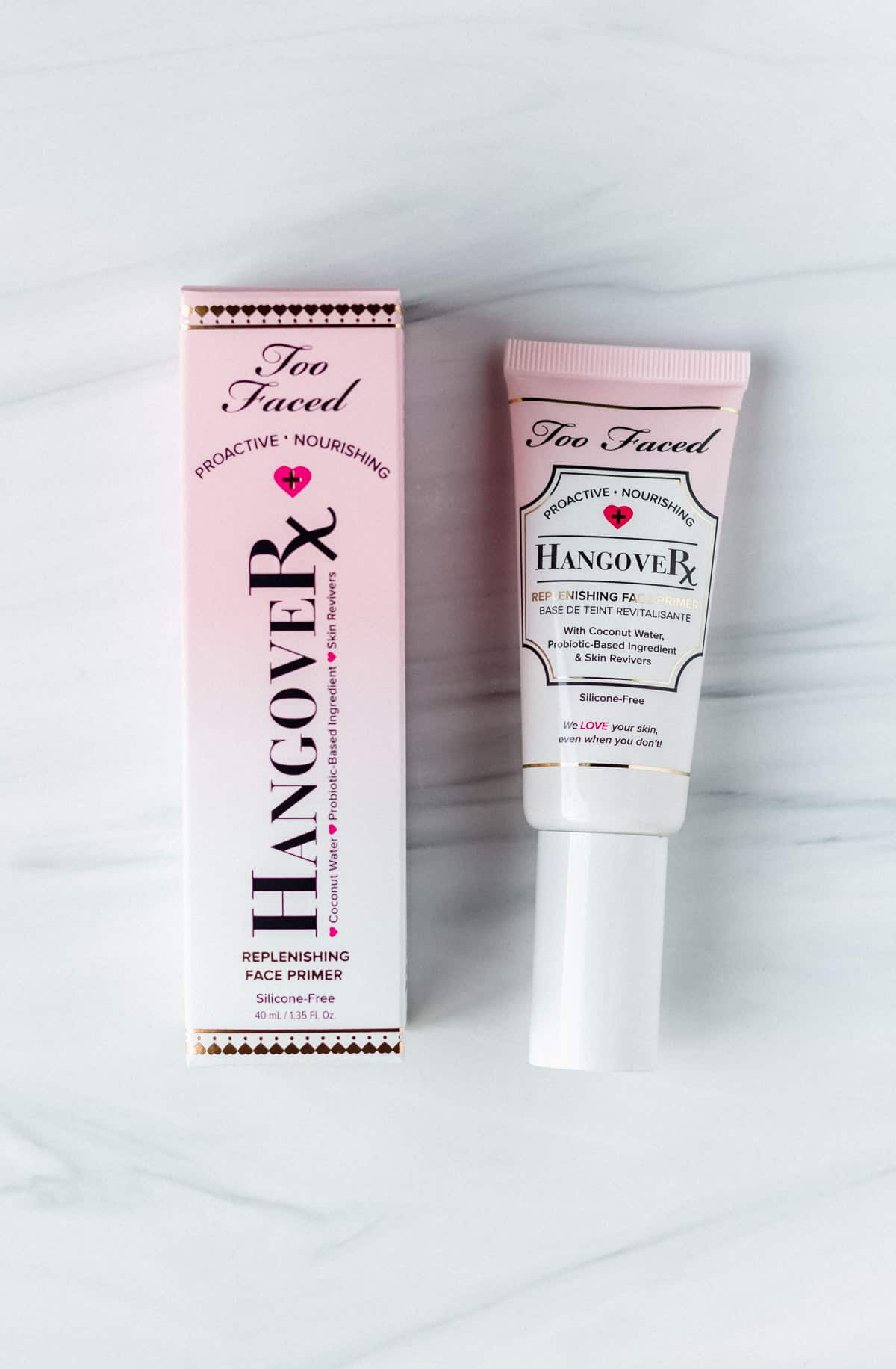 Too faced hangover primer box and tube on a white background