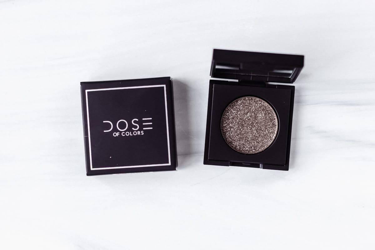 Dose of Colors Block Party Single Eyeshadow in Refelction and its box on a white background