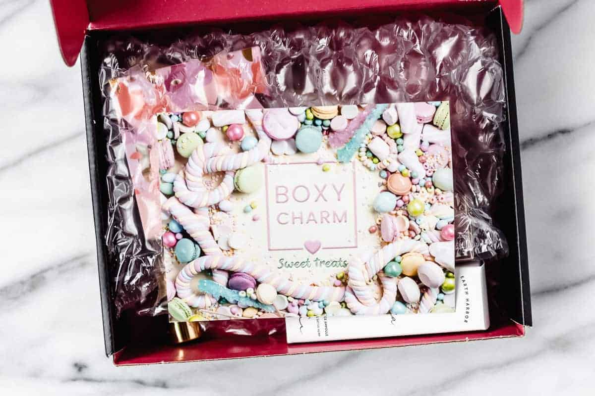Opened april 2021 boxycharm box with the insert card on top