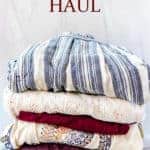 Stack of folded clothes with text overlay