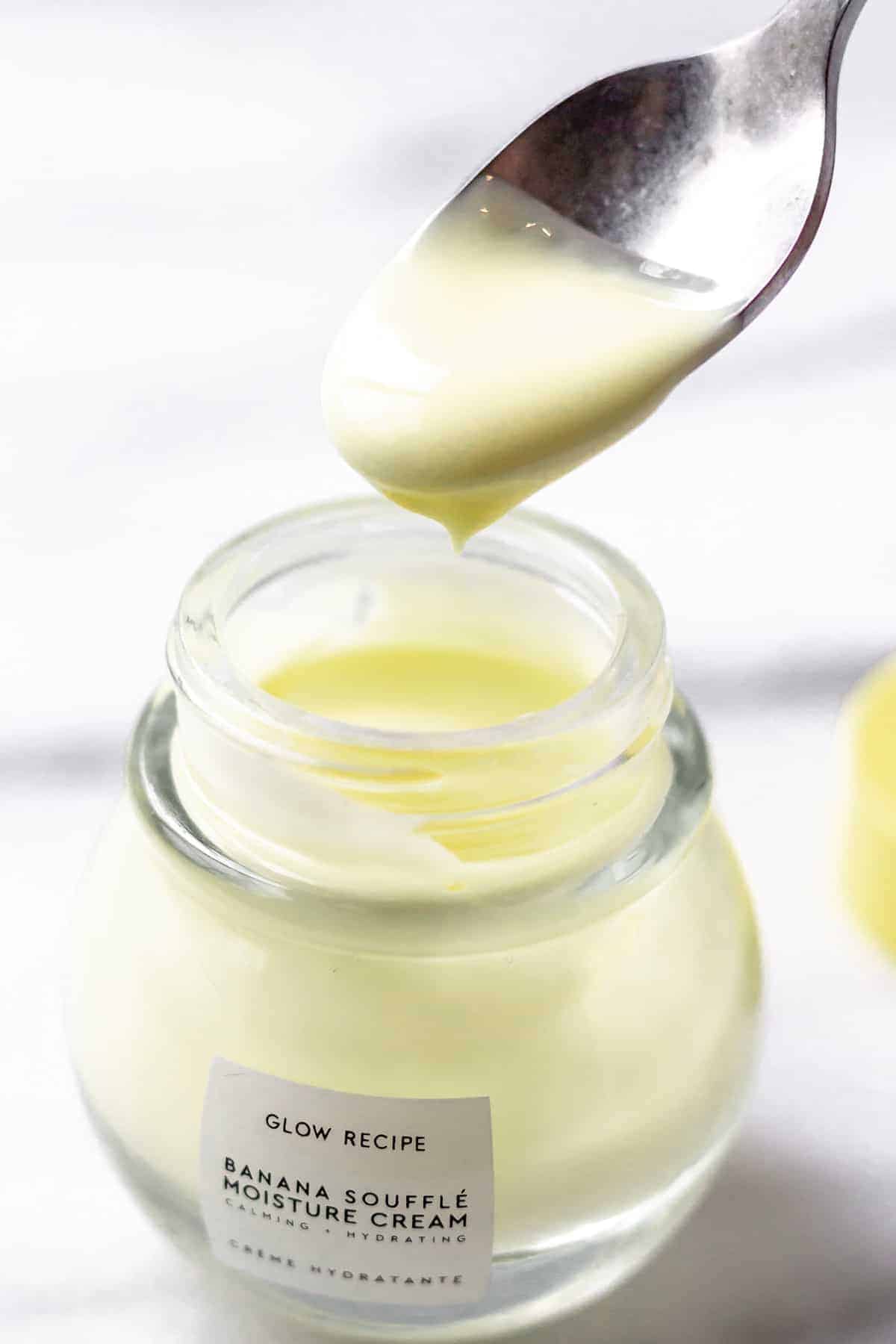 Jar of Glow Recipe Banana Souffle with a small spoon scooping some up