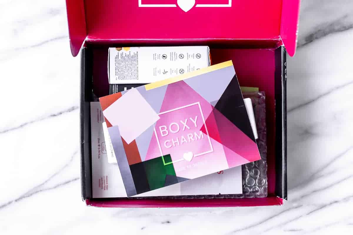 Opened June 2021 Boxycharm base box with the insert card on top