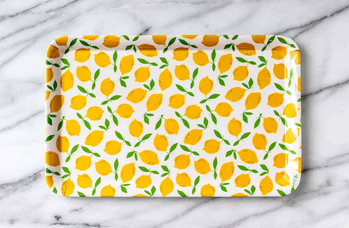 To The Market Lemon Melamine Printed Tray on a marble background