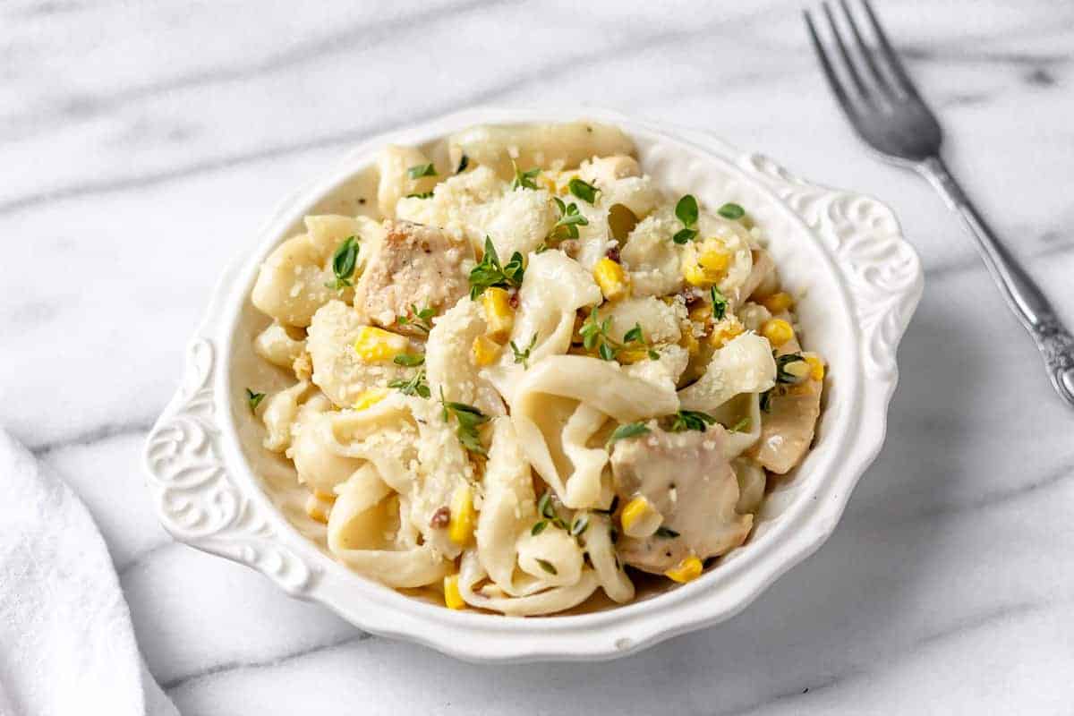 Gigli Pasta & Diced Chicken with Sweet Corn & Bacon Cream Sauce from Gobble in a white bowl