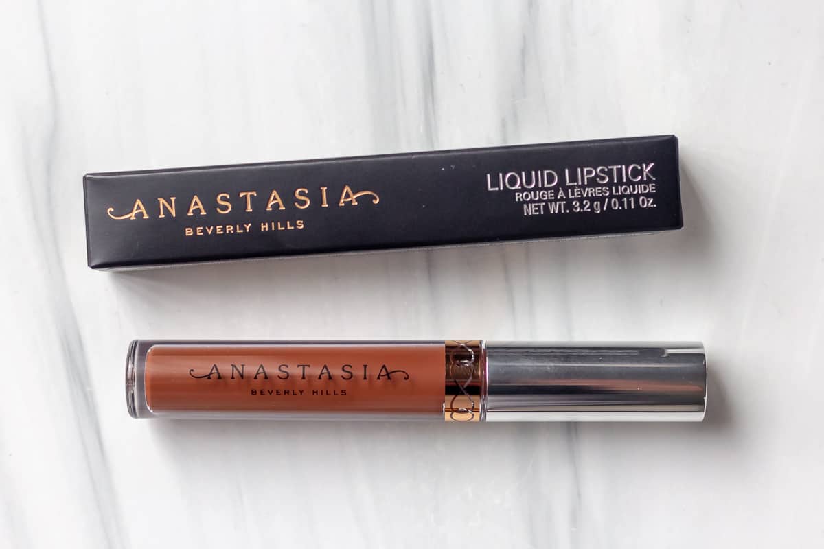 ANASTASIA BEVERLY HILLS Liquid Lipstick in Malt tube and box on a white background