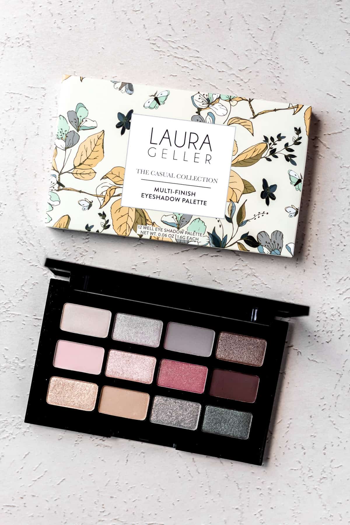 Laura Geller The Casual Collection Multi-Finish Eyeshadow Palette and box on a light background