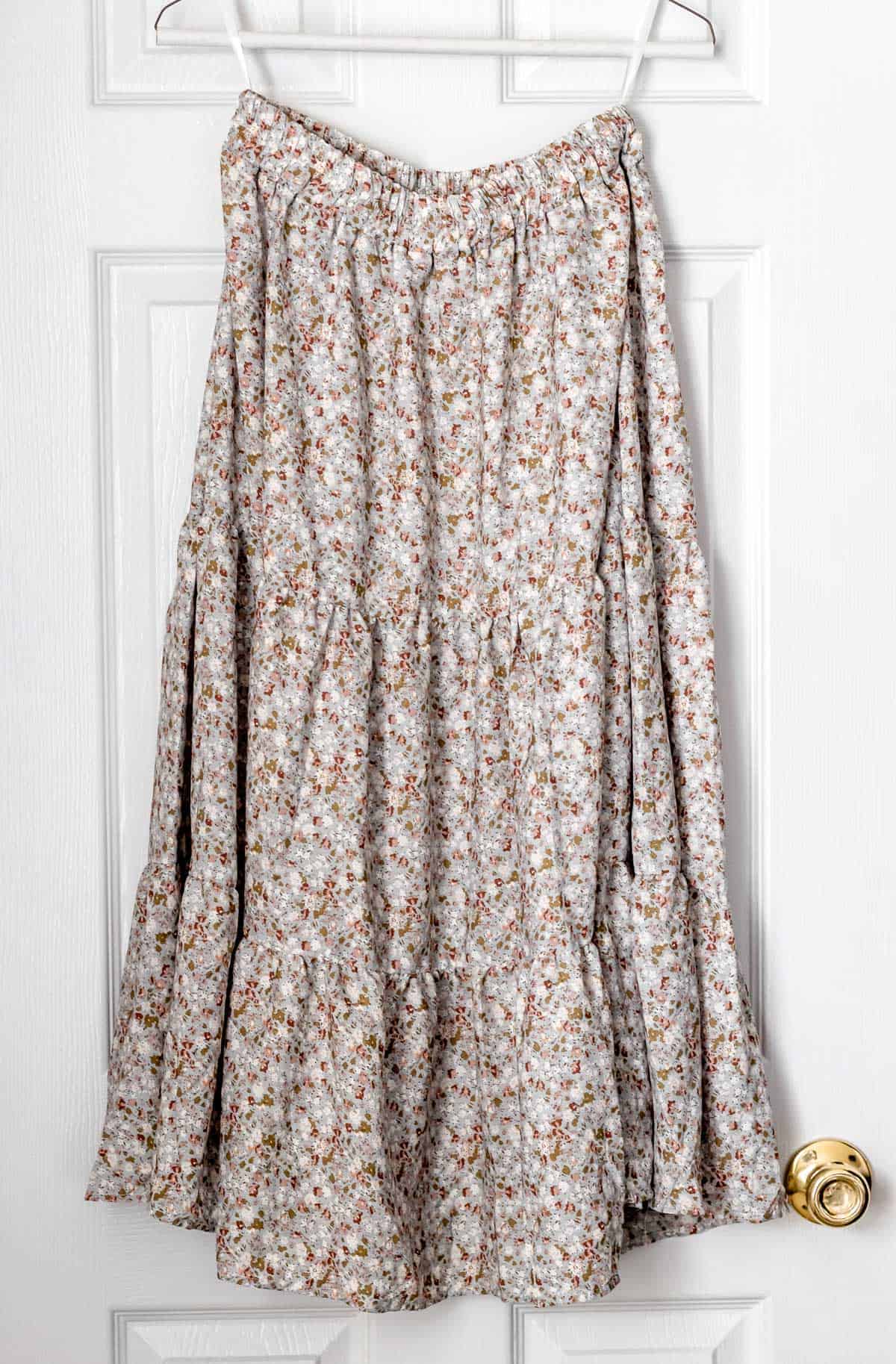 Ditsy Floral Ruffle Hem Flared Skirt on a hanger