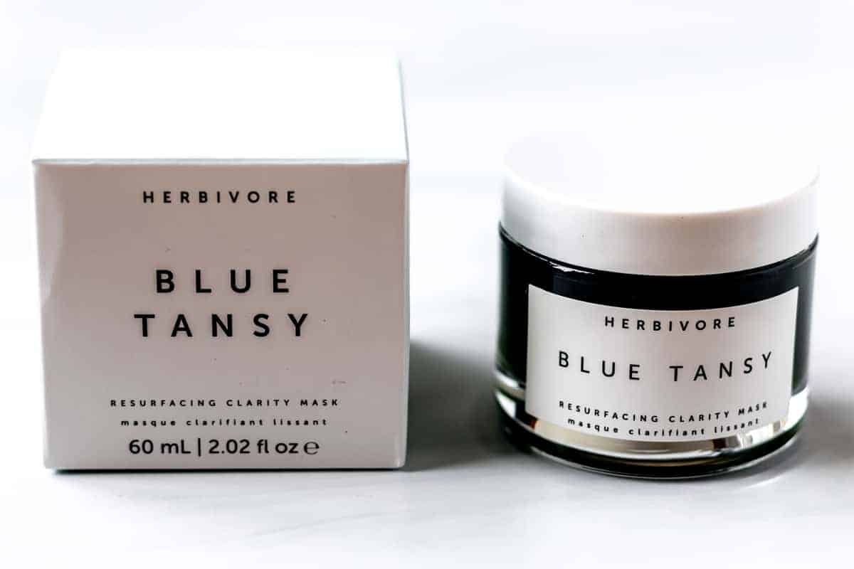 Herbivore Botanicals Blue Tansy Resurfacing Clarity Mask box and jar on a white background.