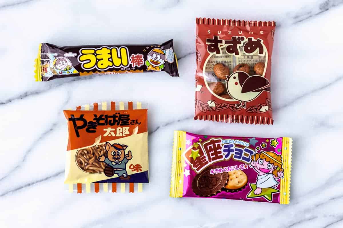 4 Japanese snacks on a marble background.