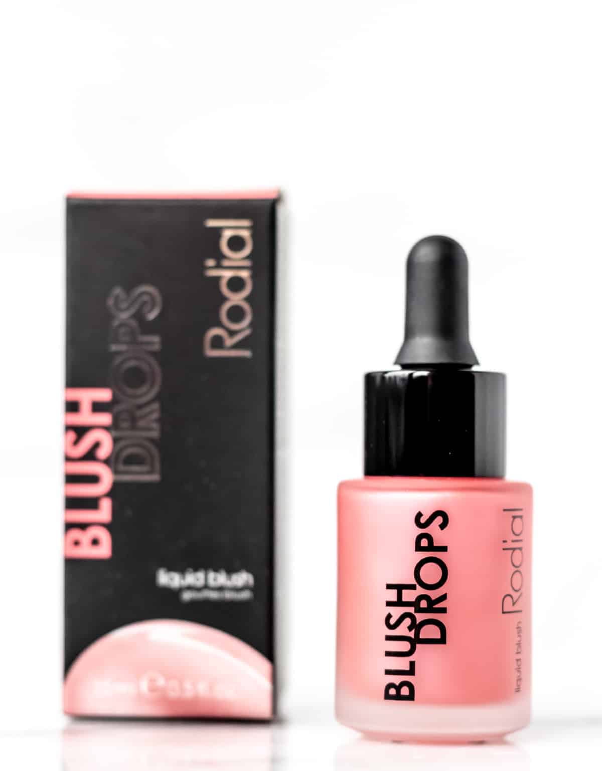 Rodial Blush Drops in Frosted Pink bottle and box on a white background.