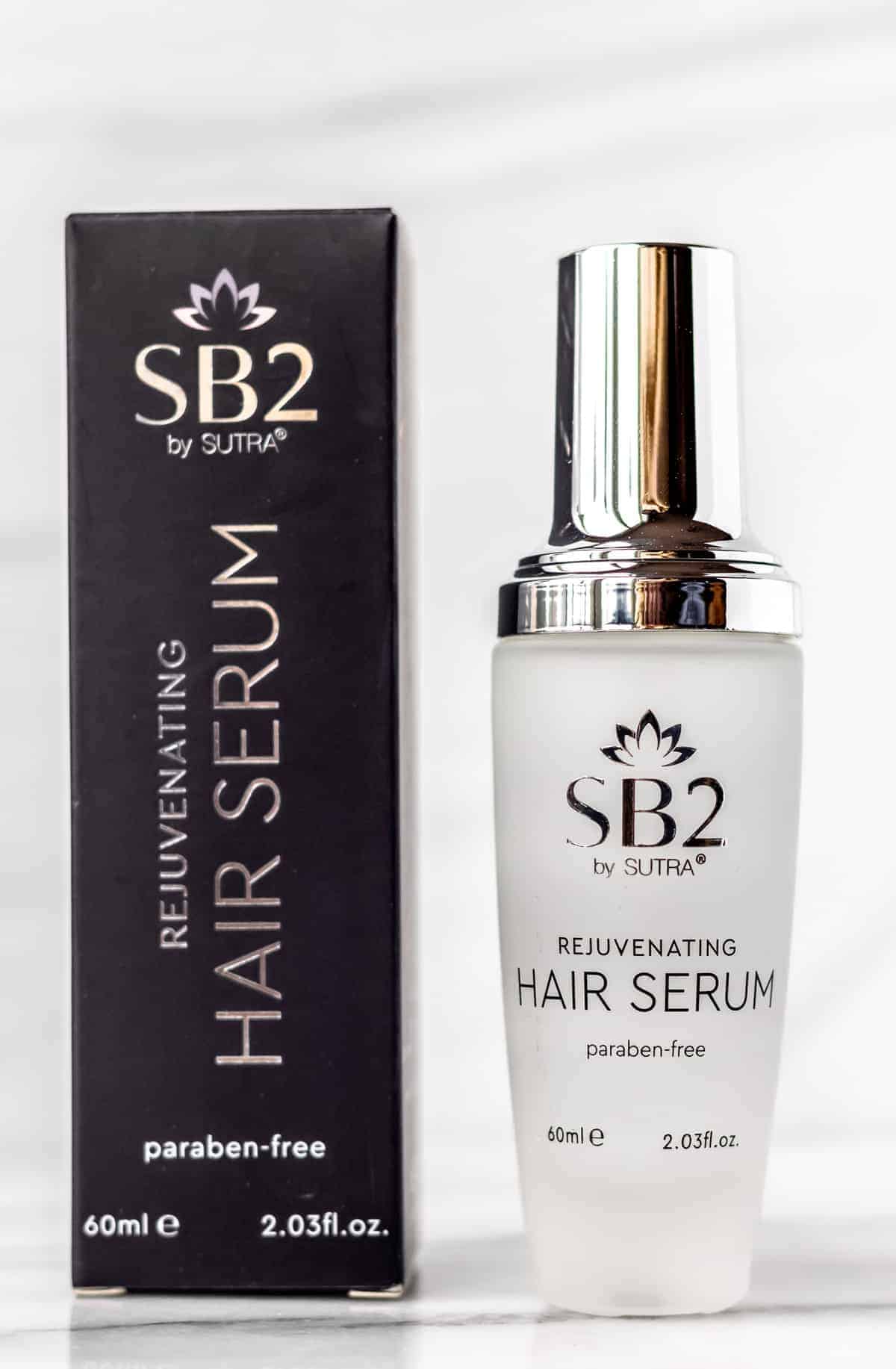 Sutra Beauty Rejuvenating Hair Serum bottle and box on a white background.