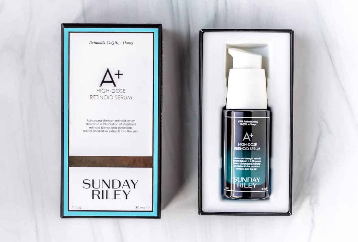 Sunday Riley A+ High-Dose Retinoid Serum in the box with the lid next to it.