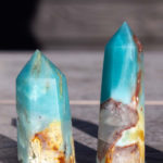 2 Caribbean calcite towers with text overlay.
