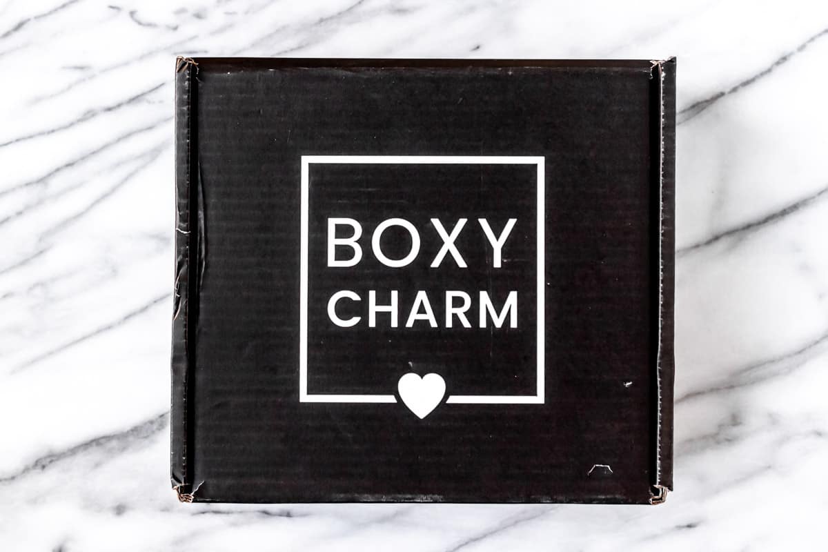 January 2022 Boxycharm Premium box on a marble background.