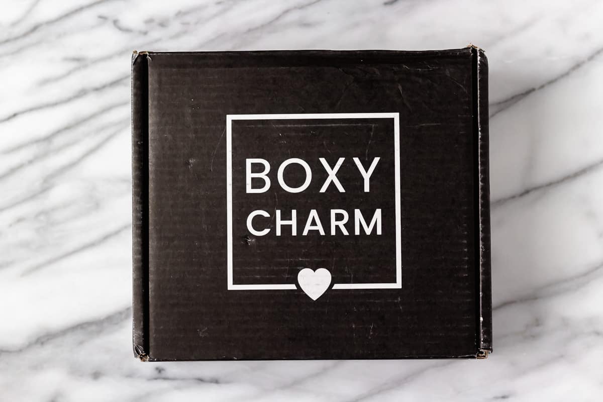 February 2022 Boxycharm box on a. marble background.