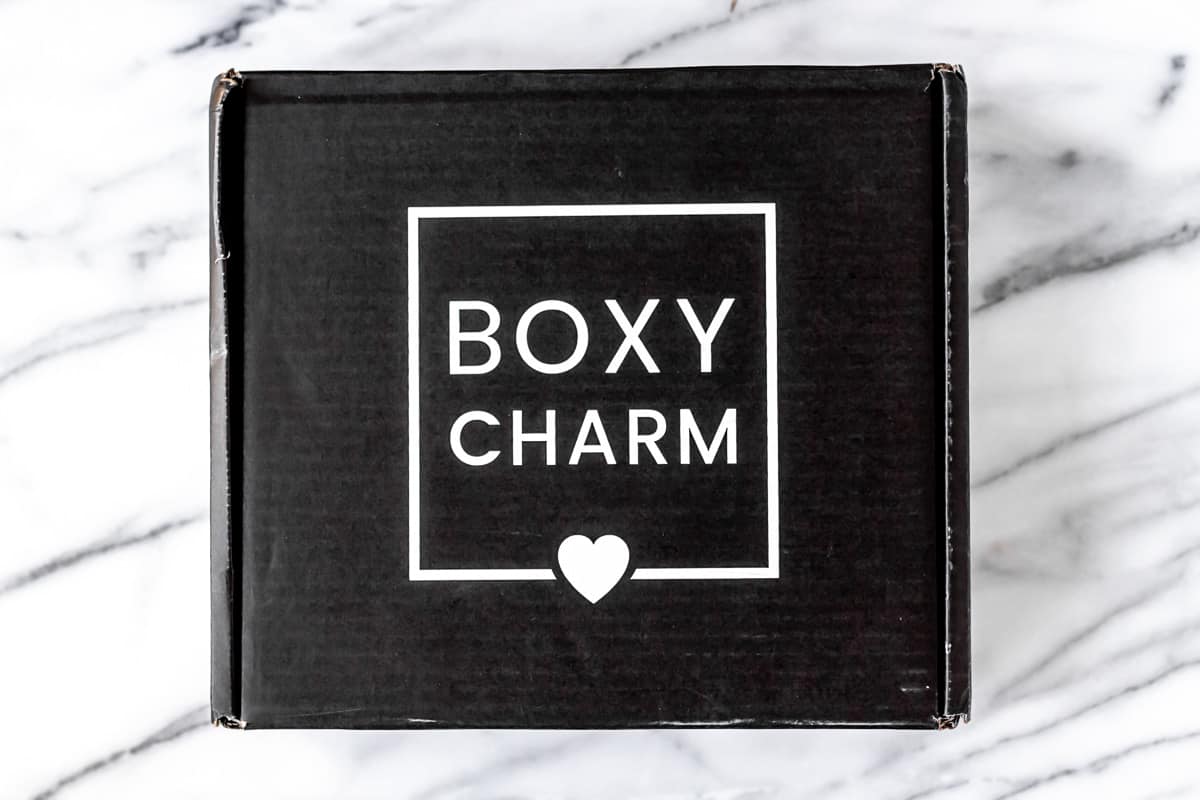 March 2022 Boxycharm Premium Box on a marble background.