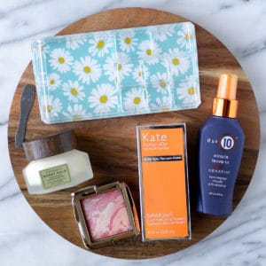 All of the items from my Spring 2022 FabFitFun box on a marble background.