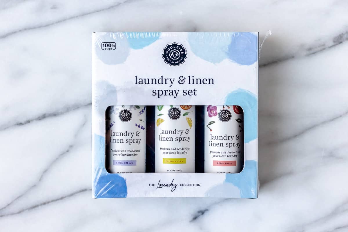 Woozies Laundry & Linen Spray Set on a marble background.