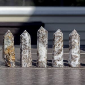 Sphalerite towers lined up on a table.