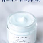A jar of Earth Harbor Azure Regenerative Neck Cream with the lid off sitting behind it with text overlay.